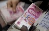 IMF称中国债务水平“危险” 面临破坏性调整
