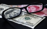 中国外汇储备一年内下降3000亿美元，钱都去哪儿了?