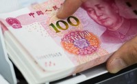 中国央行“挤压”离岸人民币投机 市场转至远期